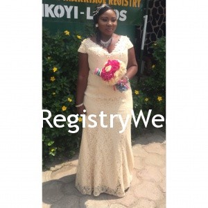 Bride shows off her marriage certificate