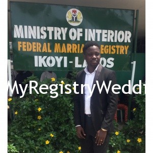 Groom stylishly shows off his wedding ring